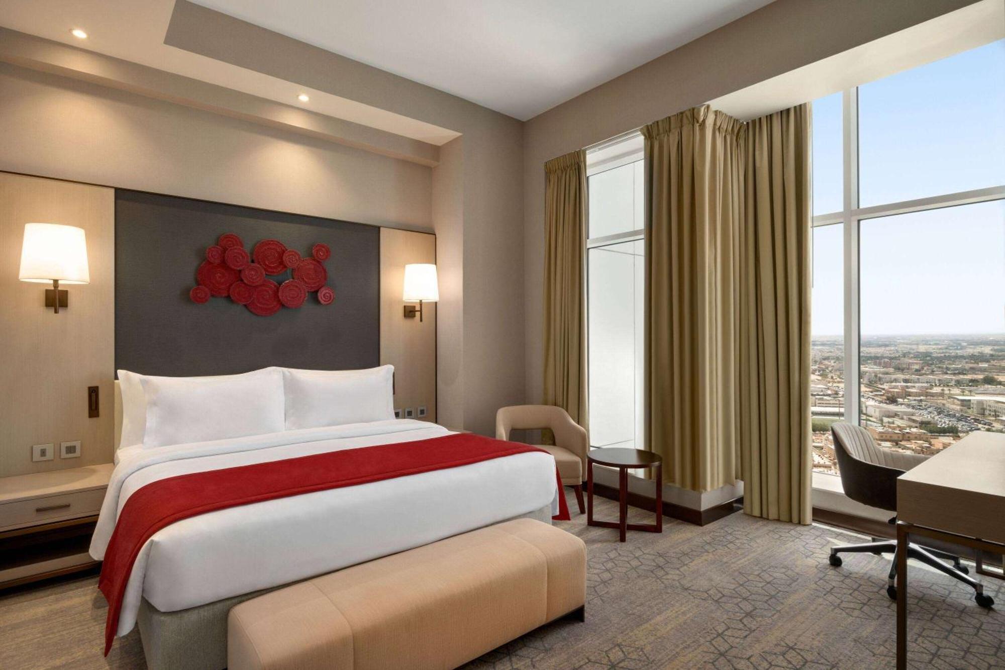 Ramada By Wyndham Riyadh King Fahd Road Экстерьер фото A bedroom at the hotel